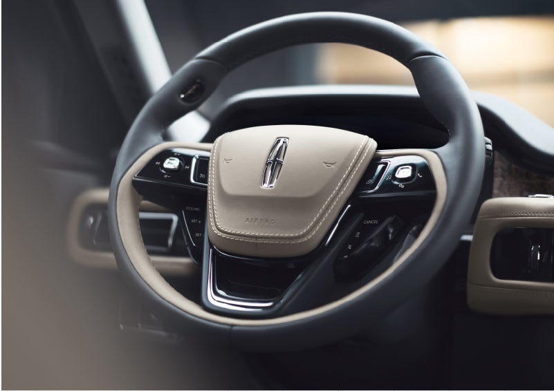 The intuitively placed controls of the steering wheel on a 2023 Lincoln Aviator® SUV | Performance Lincoln Bountiful in Bountiful UT