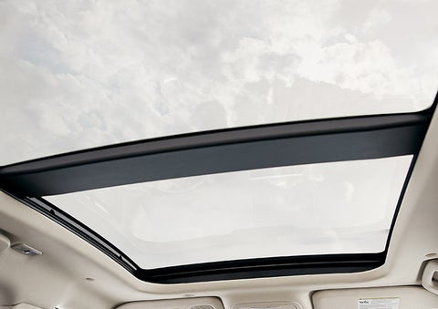 The available panoramic Vista Roof® is shown from inside a 2023 Lincoln Corsair® SUV. | Performance Lincoln Bountiful in Bountiful UT