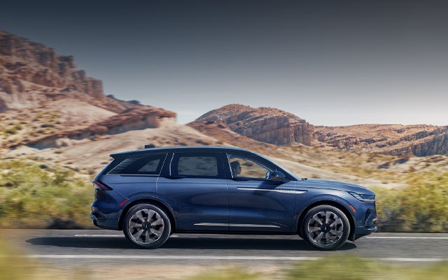 A 2024 Lincoln Nautilus® SUV is being driven in a desert setting. | Performance Lincoln Bountiful in Bountiful UT